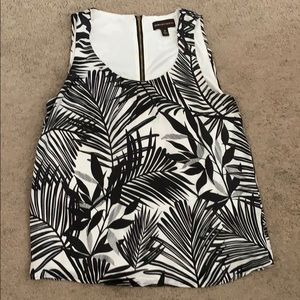 Tank top with gold zipper in the back.